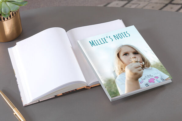 Hardcover notebook with personalised front cover photo.